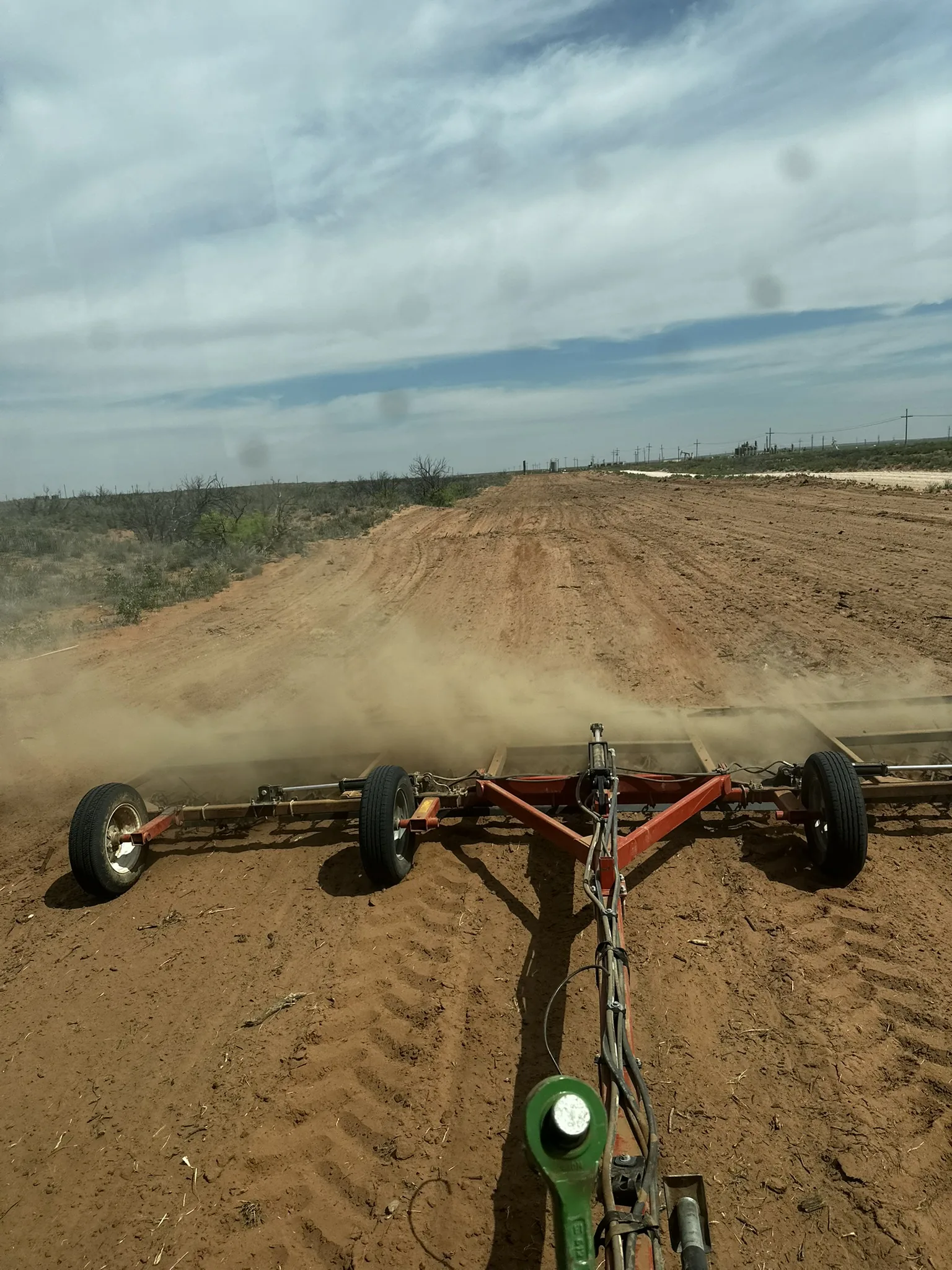 Drag implement preparing a West Texas right-of-way